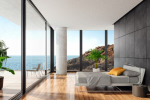 Bedroom with sea view and concealed speakers.