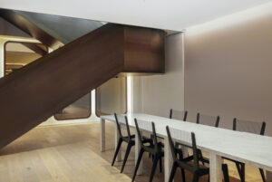 Dining room with concealed sonos speakers.